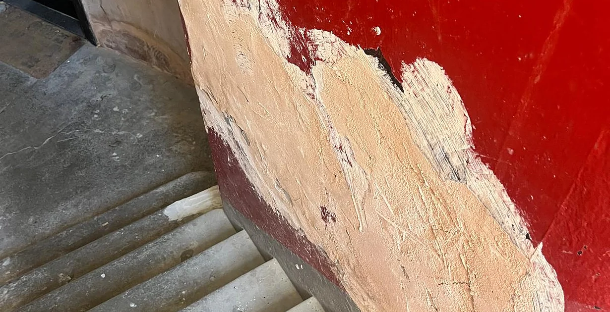 Tenement stair in disrepair — fabric repair before retrofit