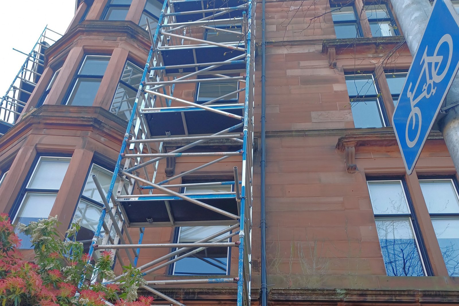 Scaffolding and drainage pipe on Glasgow tenement