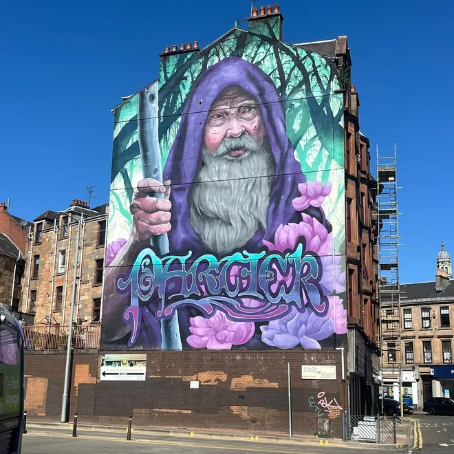 The Paisley wizard mural on a tenement gable end, part of the Paisley Mural Trail