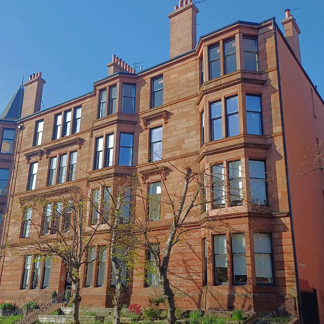 Tenement in Hyndland area showing classic red sandstone facade